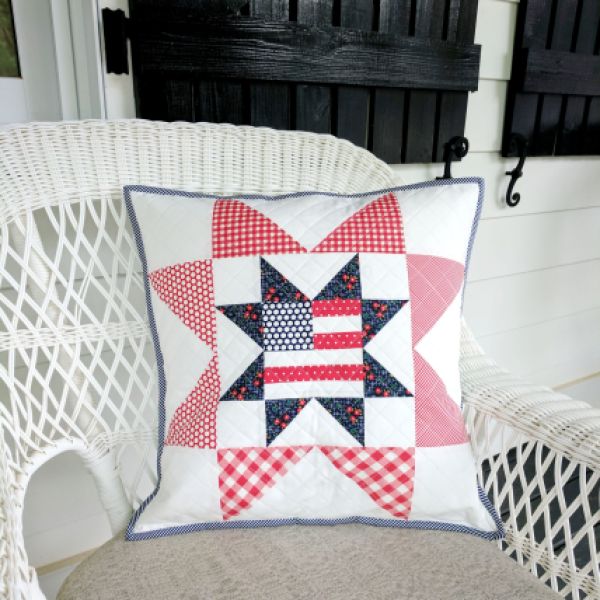"Patriotic Stars" is a Free Quilted Patriotic Pillow Pattern designed by Sara Noda from SewingSeams.com!